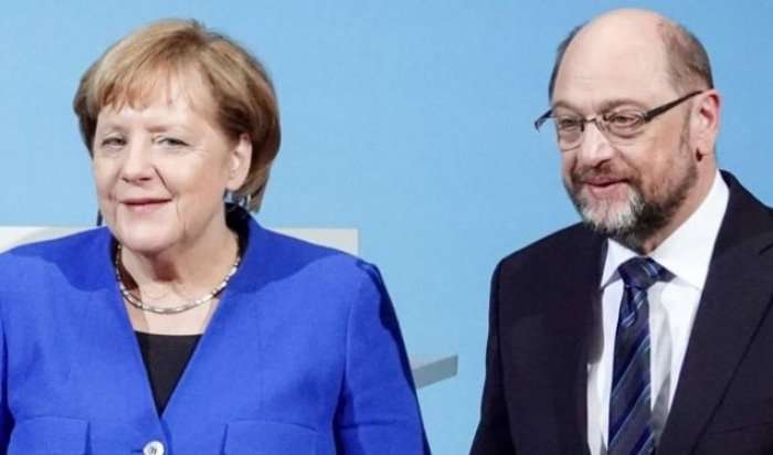 Konservatorët kritikojnë Merkelin pas humbjes së ministrive kryesore
