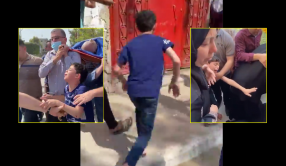 Djaloshi palestinez vrapon pas kufomës së babait të vrarë nga sulmet ajrore (VIDEO)