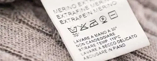 Çfarë kuptimi kanë simbolet në etiketën e rrobave 