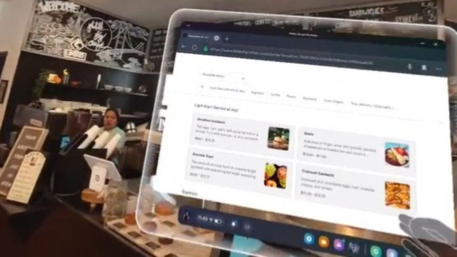 Një burrë hyn në një kafene në San Francisko duke mbajtur kufjet e reja të Meta-s dhe duke porositur